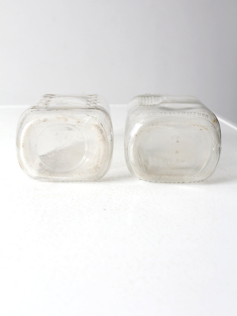vintage glass milk jugs pair