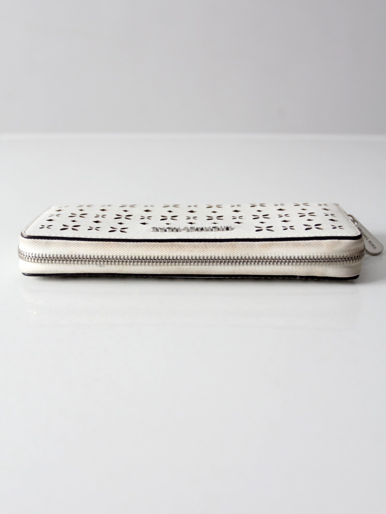 Michael Kors perforated zip around wallet