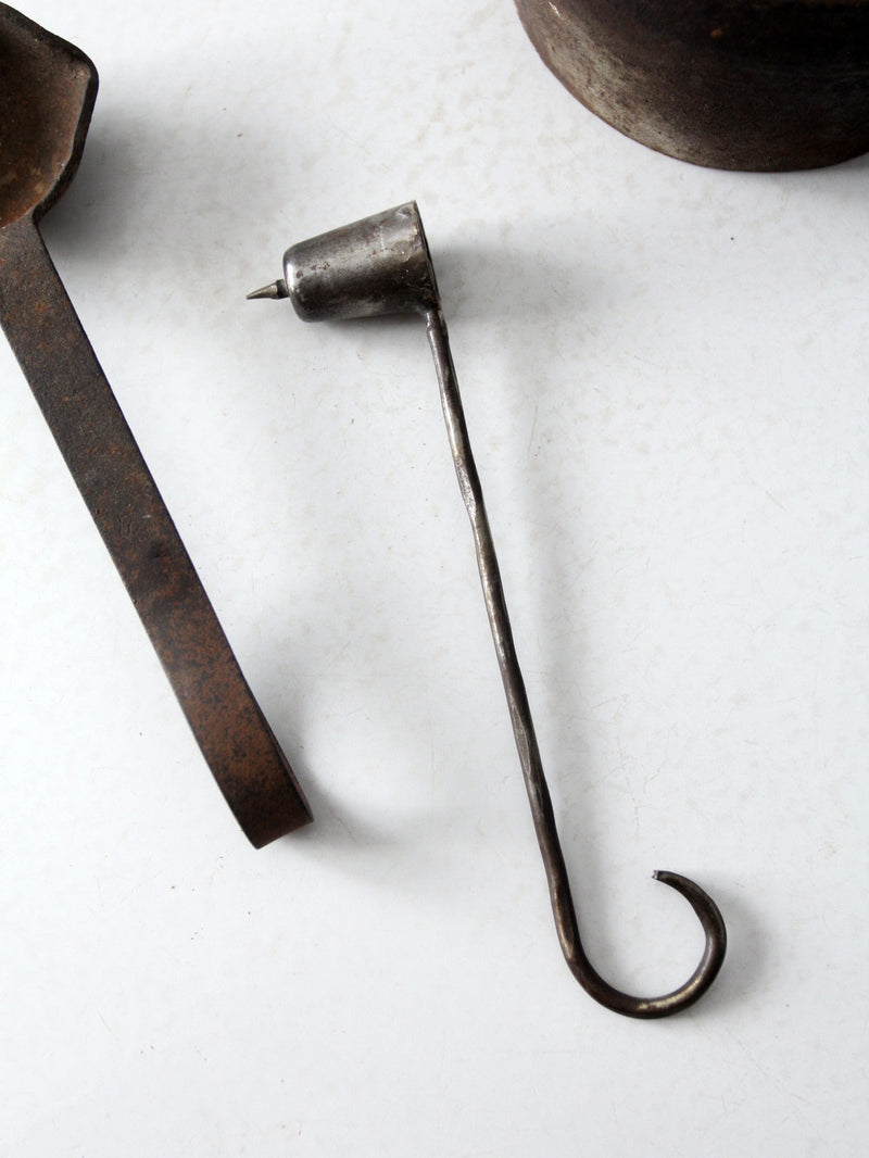 antique smelting pot and ladles