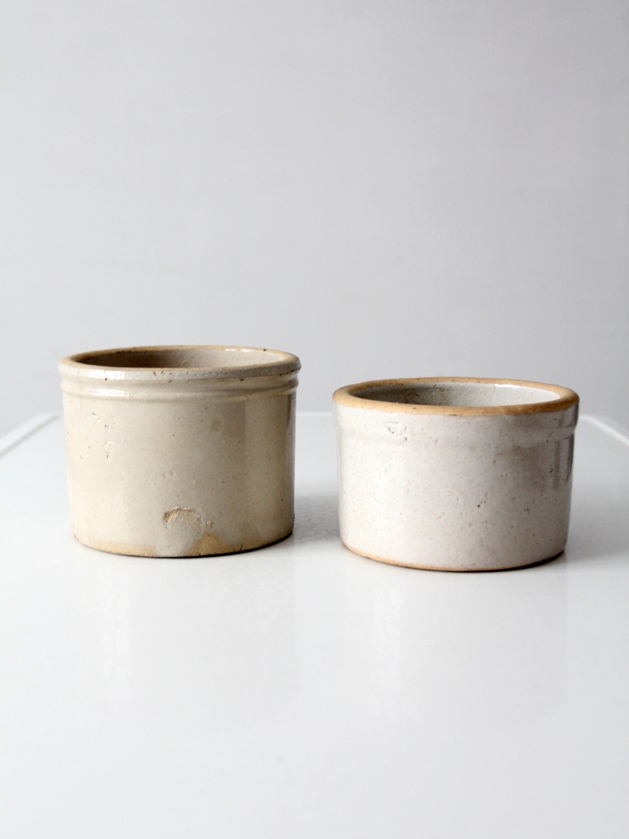 pair of antique stoneware kitchen crocks