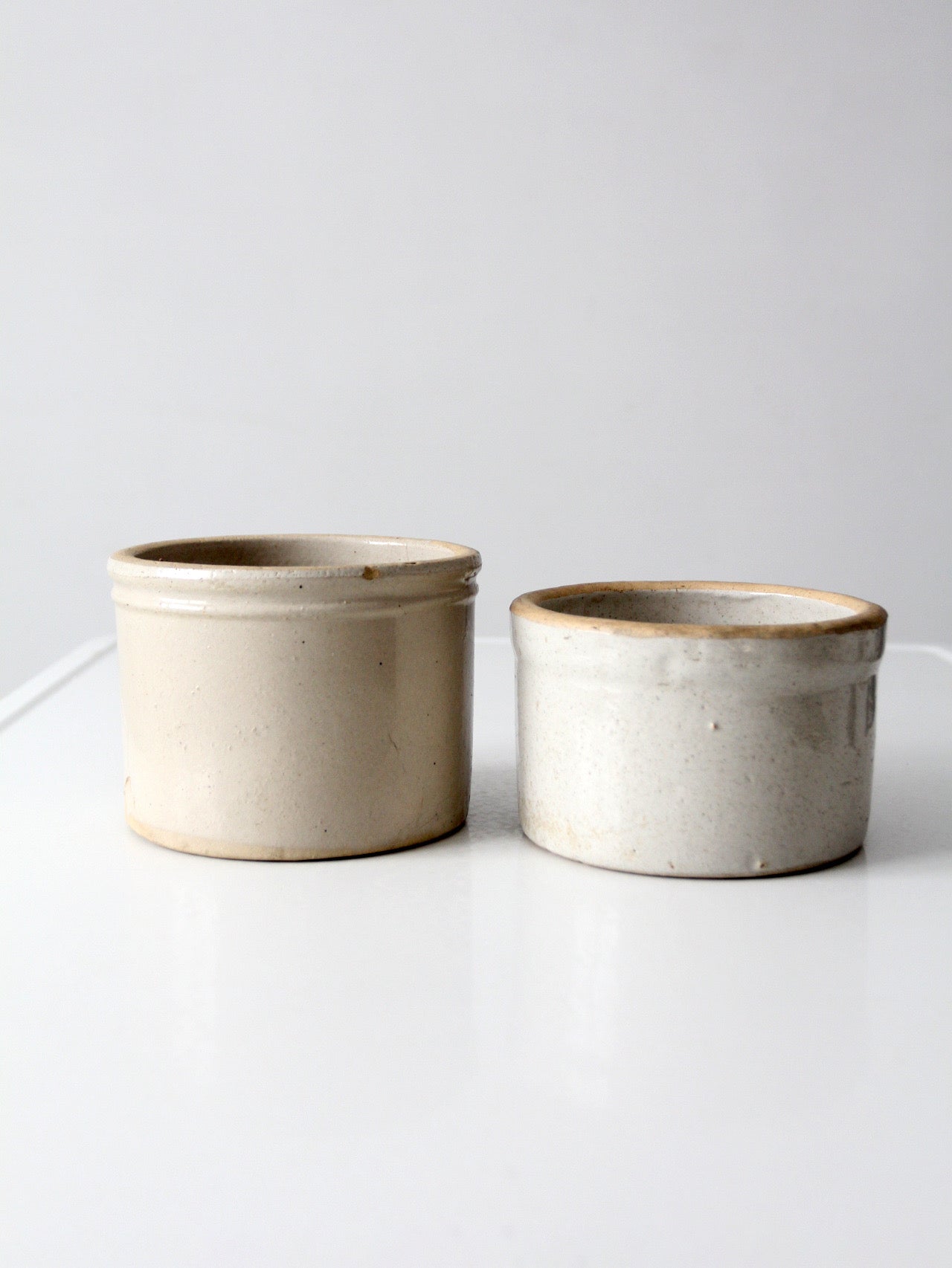 pair of antique stoneware kitchen crocks
