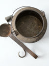 antique smelting pot and ladles