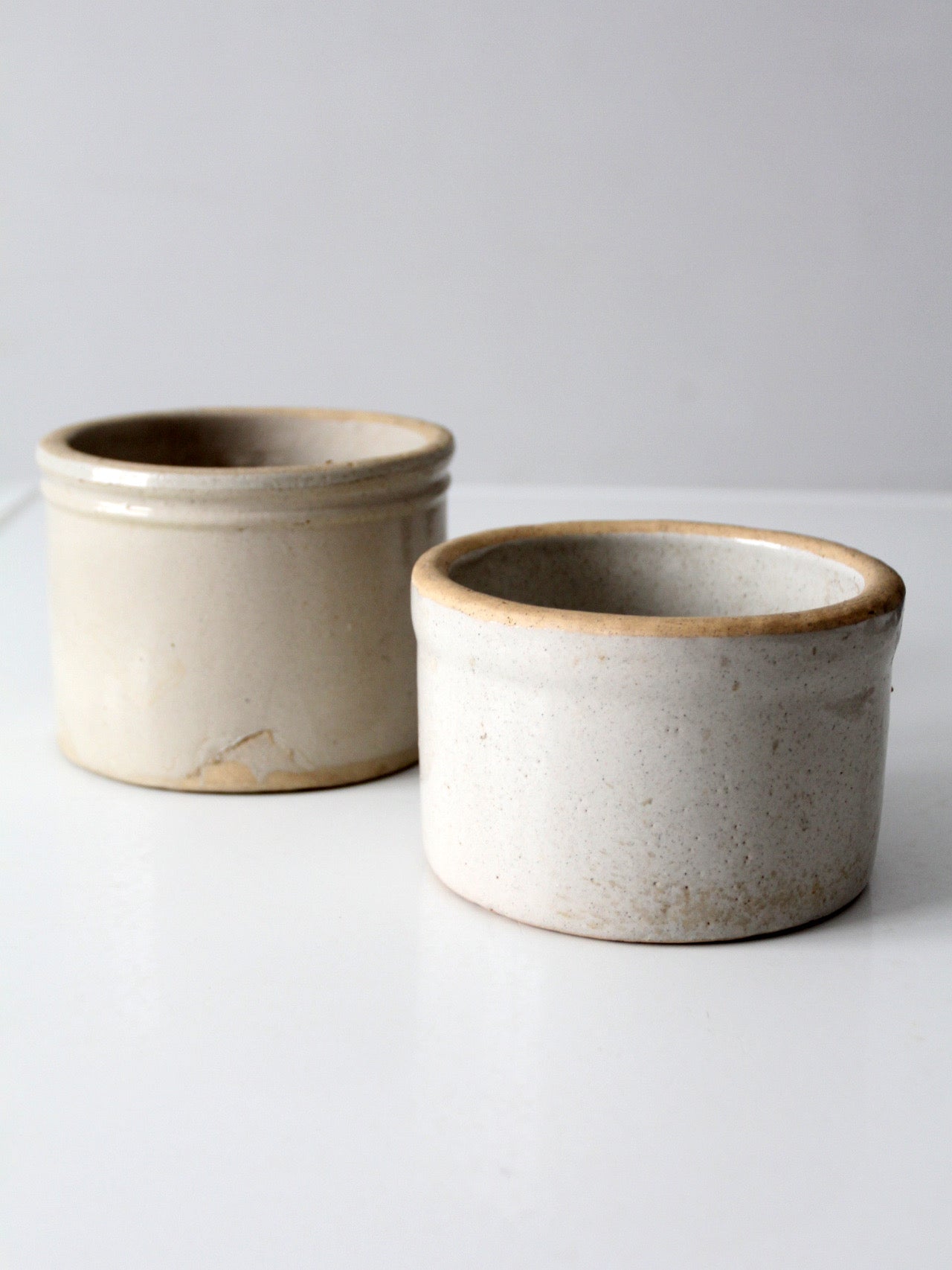 pair of antique stoneware kitchen crocks