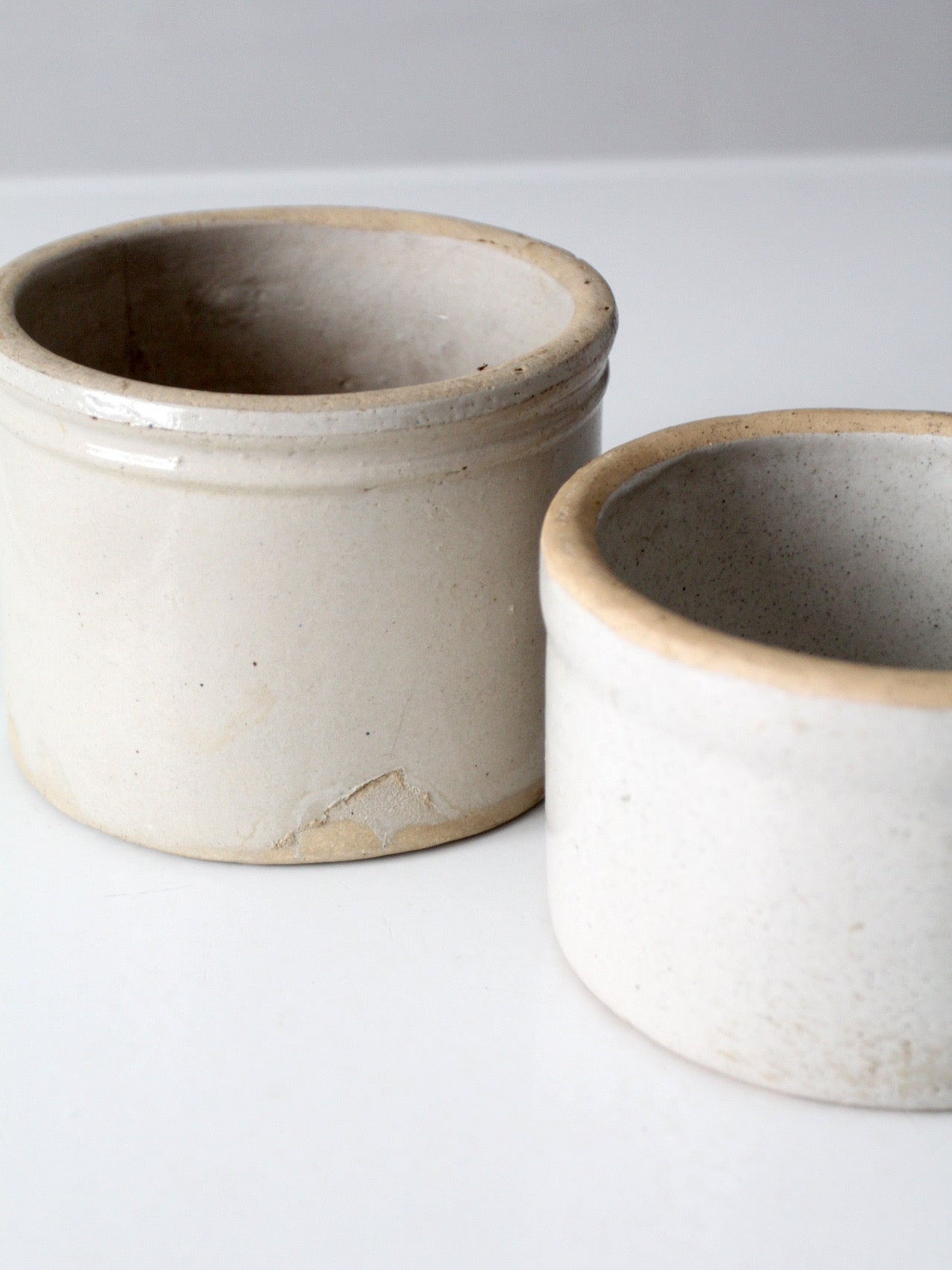 pair of antique stoneware kitchen crocks