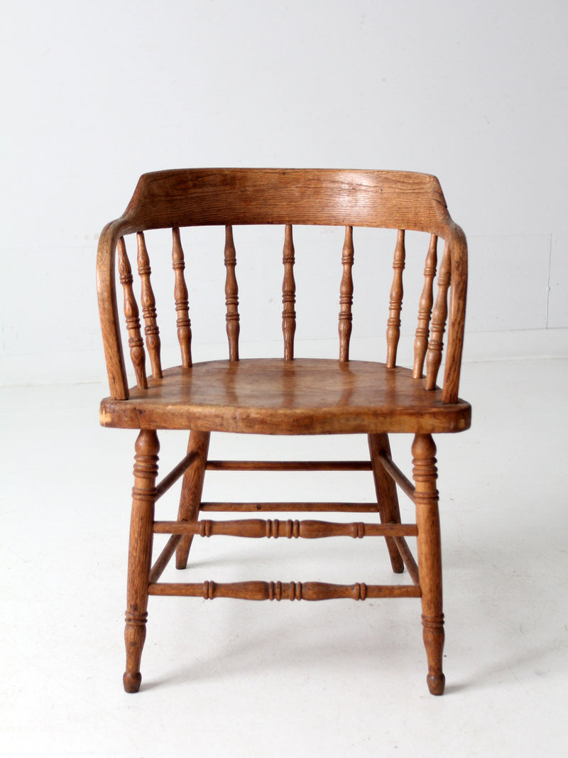 antique rustic captain's chair