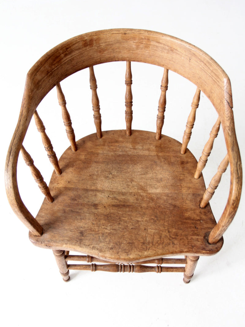 antique rustic captain's chair