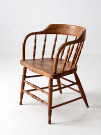 antique rustic captain's chair
