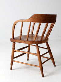 antique rustic captain's chair
