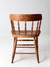 antique rustic captain's chair