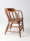 antique rustic captain's chair