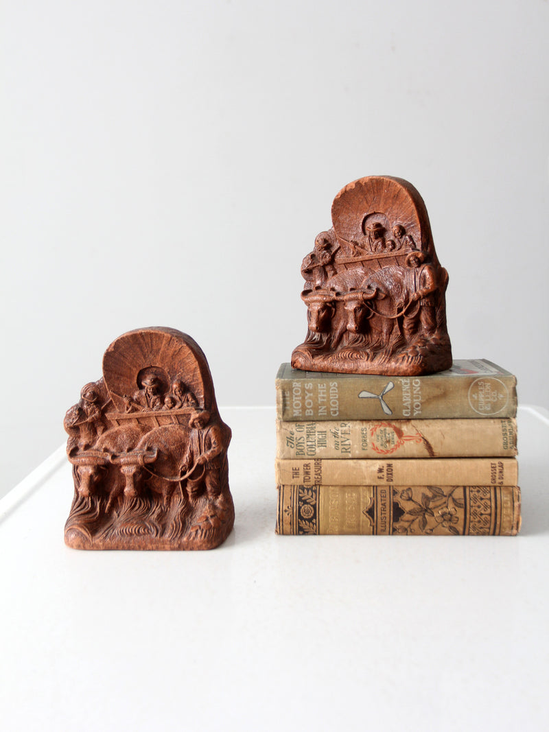 vintage Syroco covered wagon bookends pair