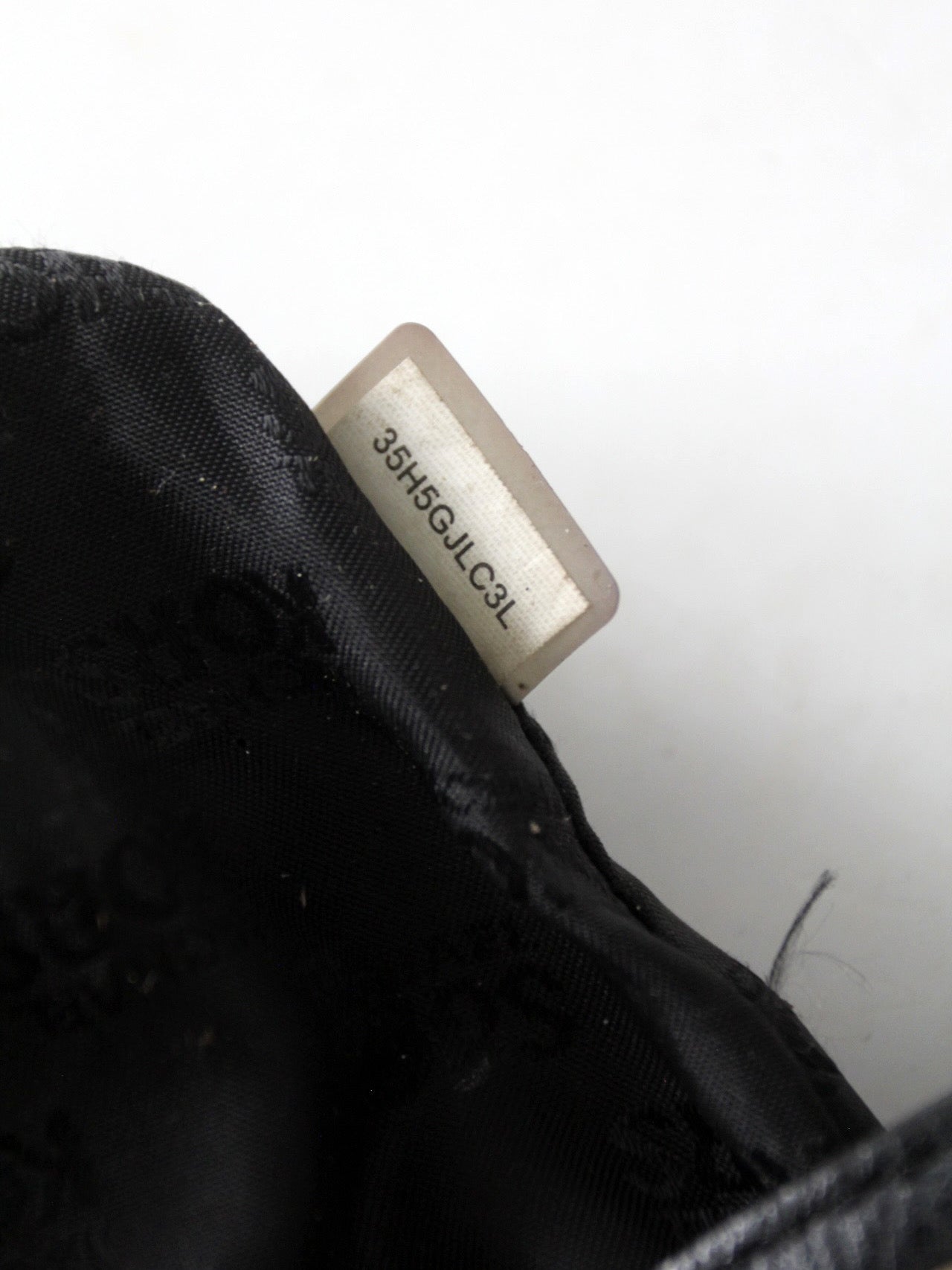Michael Kors black pebbled leather bucket bag