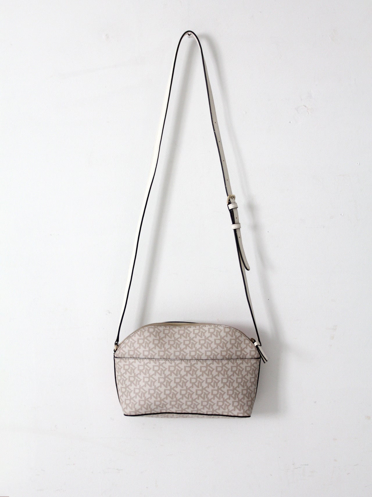 DKNY Bryant dome crossbody bag | floral logo print