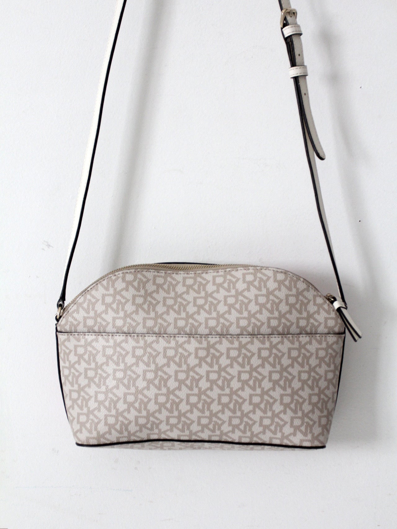 DKNY Bryant dome crossbody bag | floral logo print