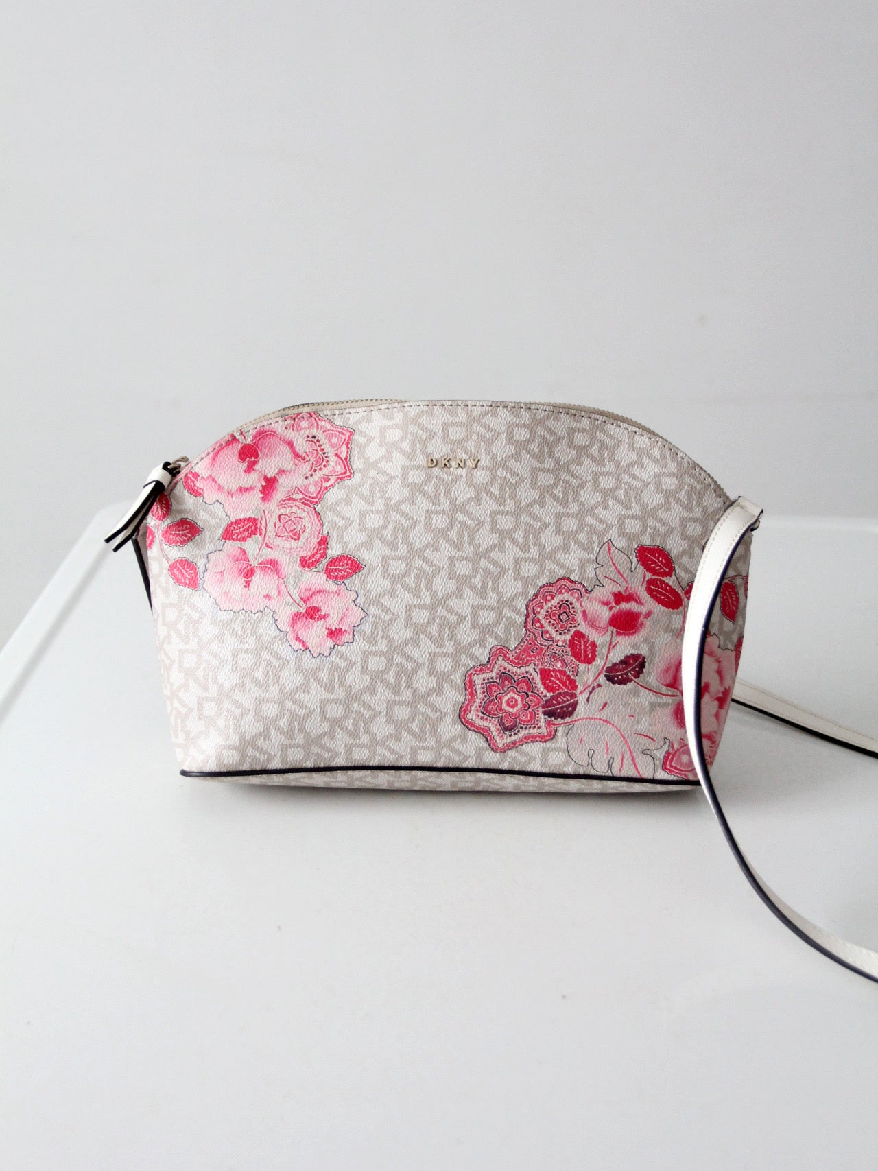 DKNY Bryant dome crossbody bag | floral logo print