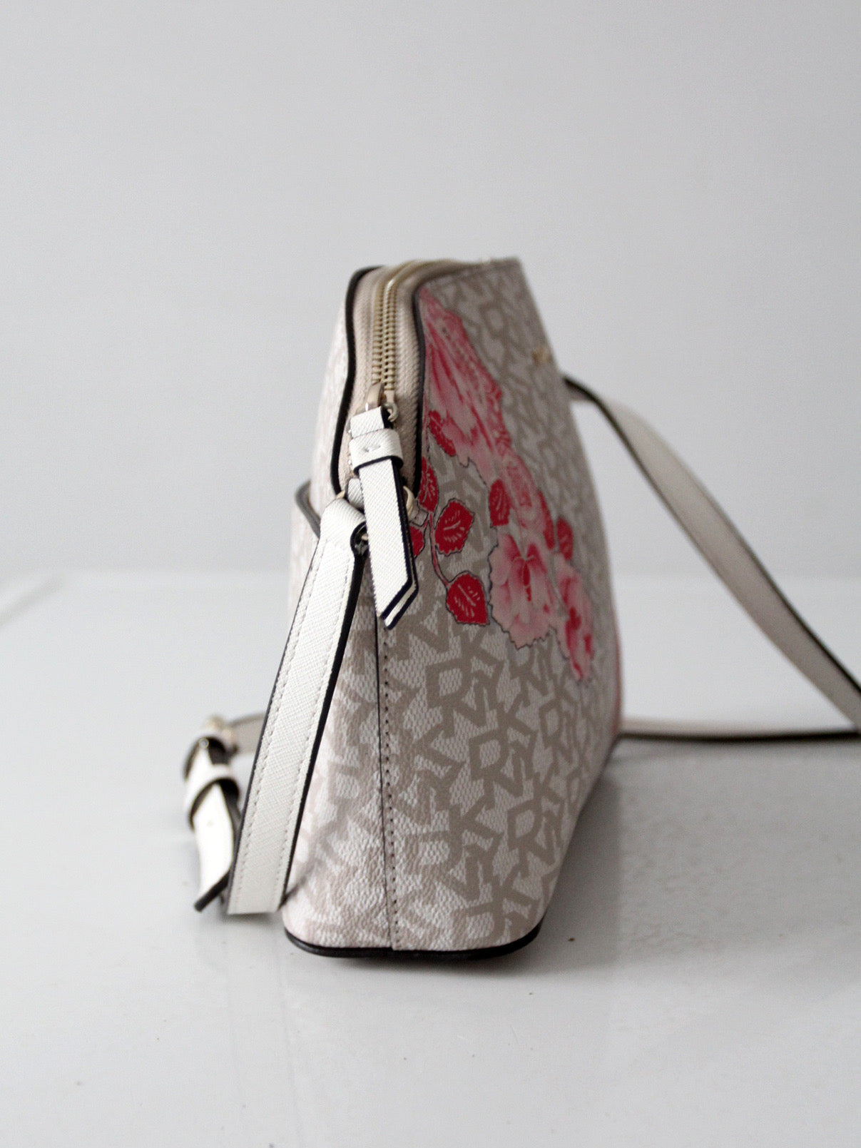 DKNY Bryant dome crossbody bag | floral logo print