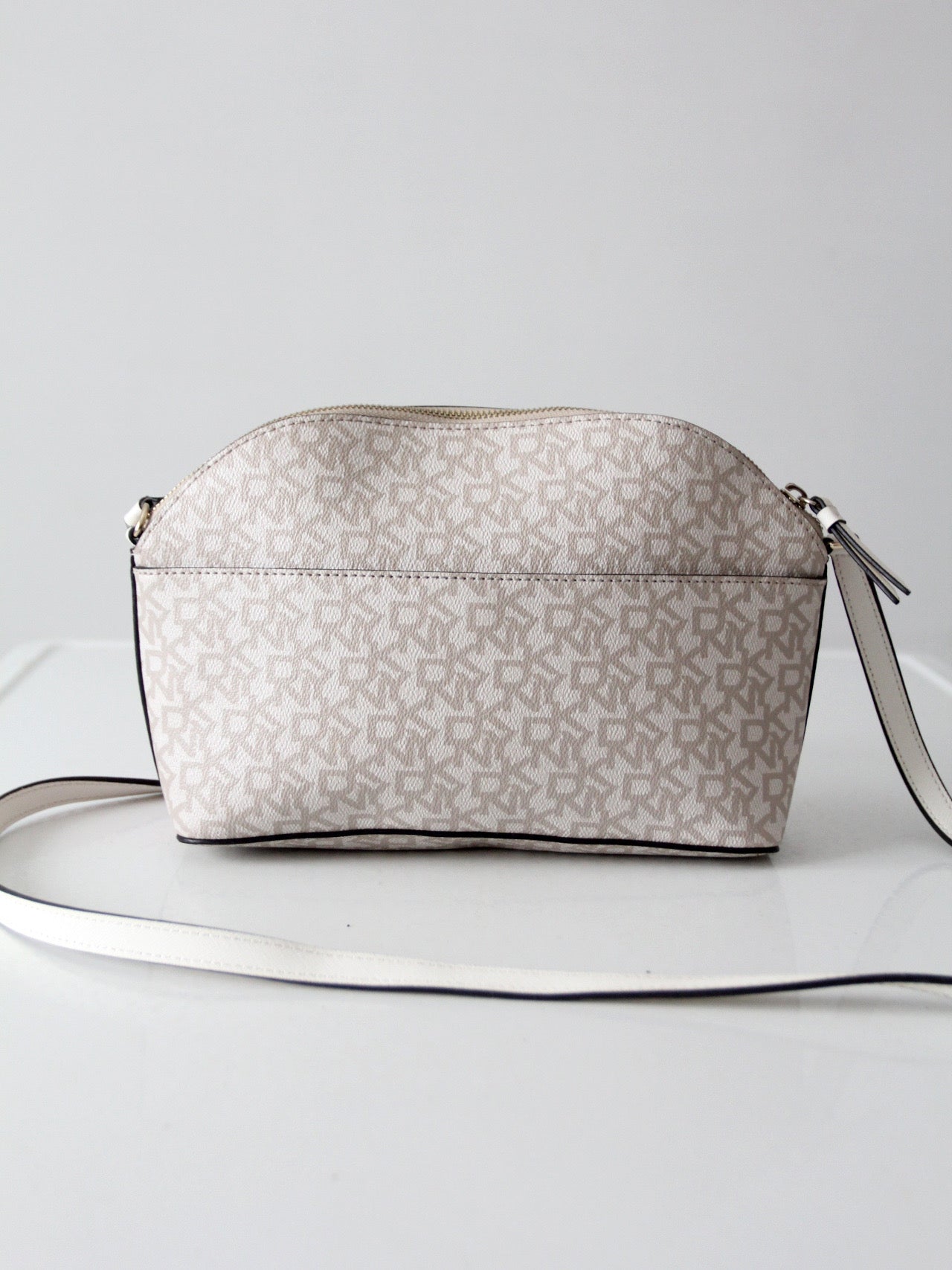 DKNY Bryant dome crossbody bag | floral logo print