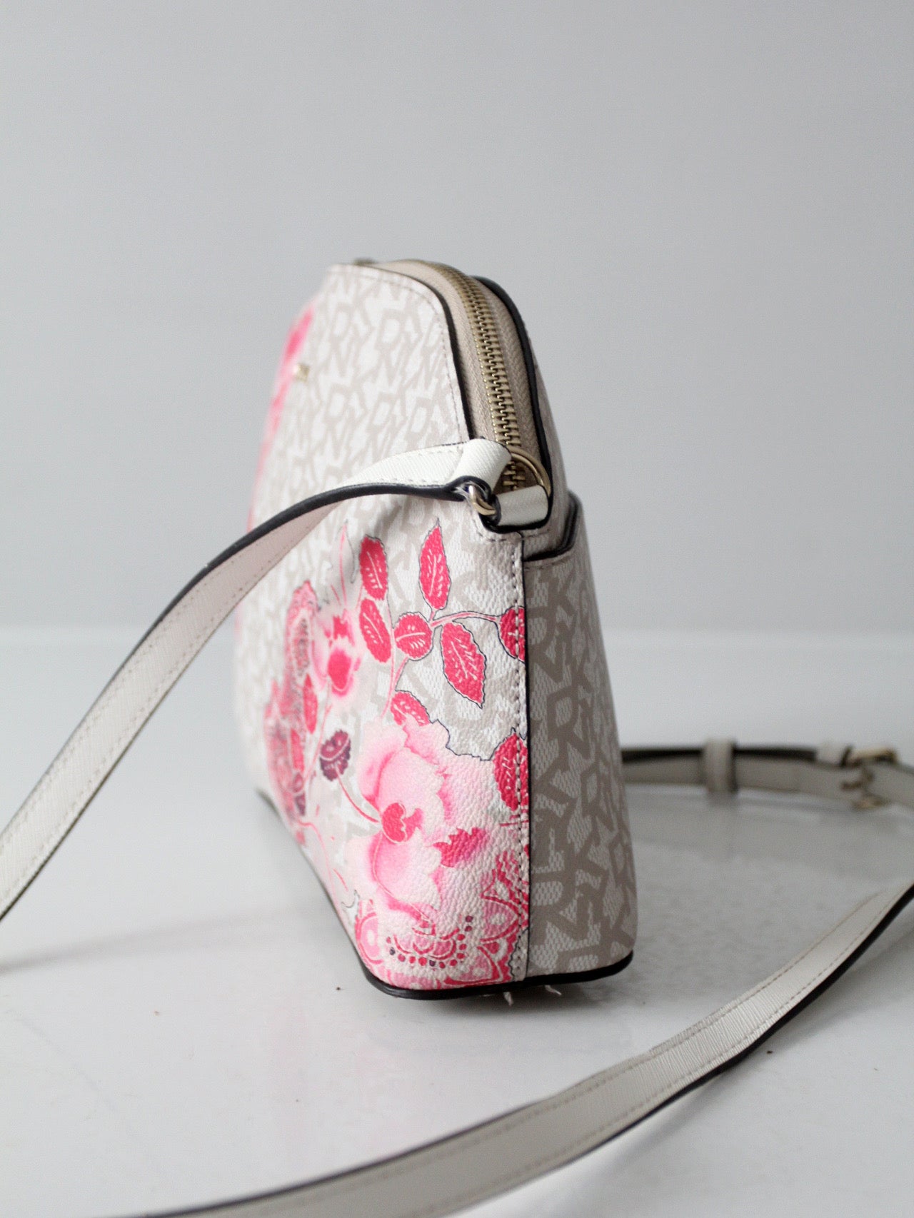 DKNY Bryant dome crossbody bag | floral logo print