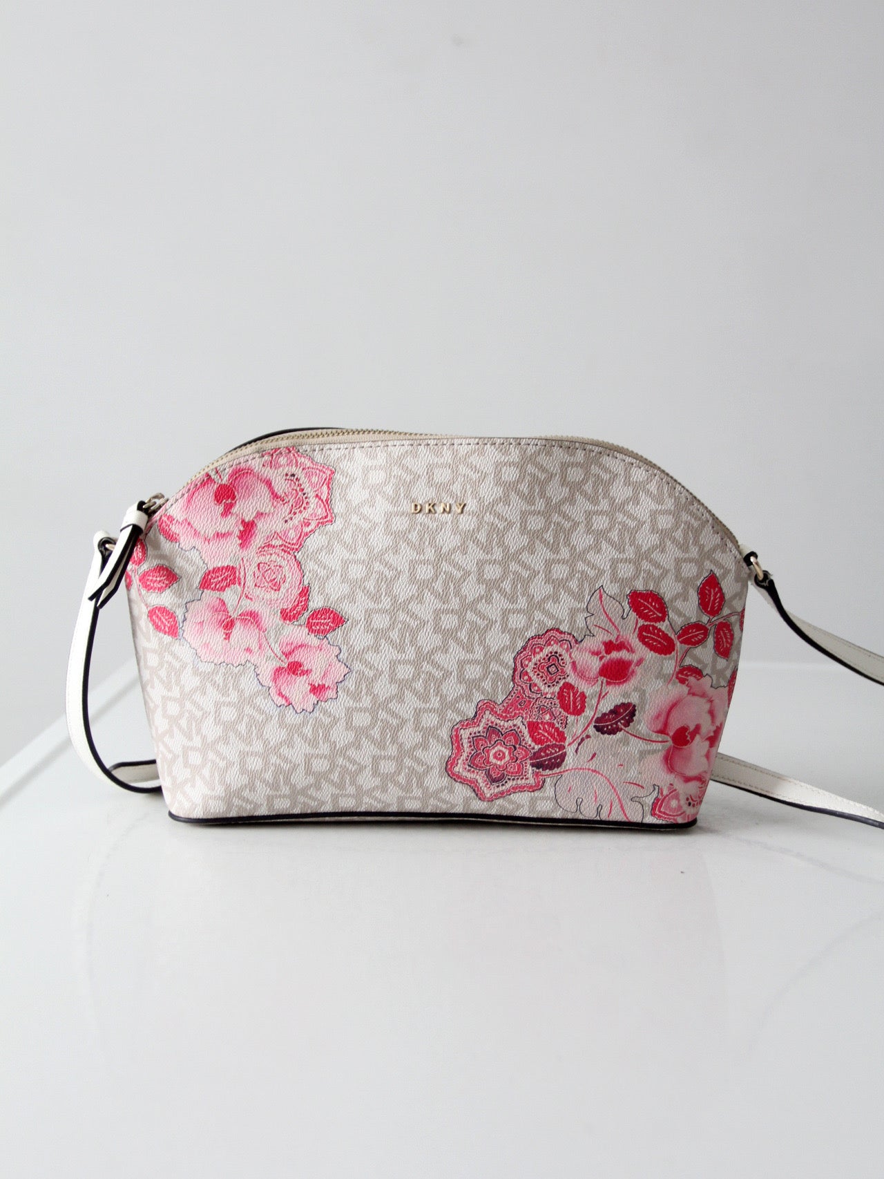 DKNY Bryant dome crossbody bag | floral logo print