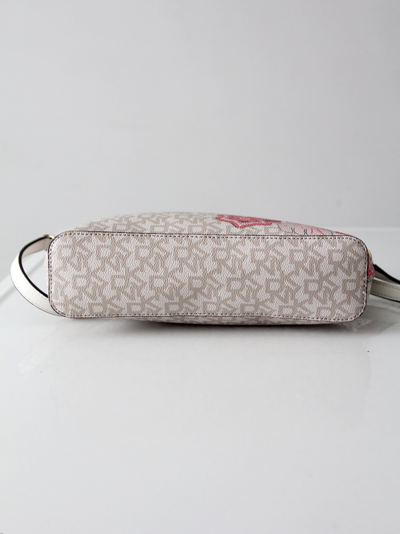DKNY Bryant dome crossbody bag | floral logo print
