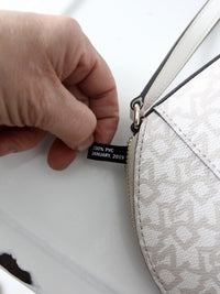 DKNY Bryant dome crossbody bag | floral logo print