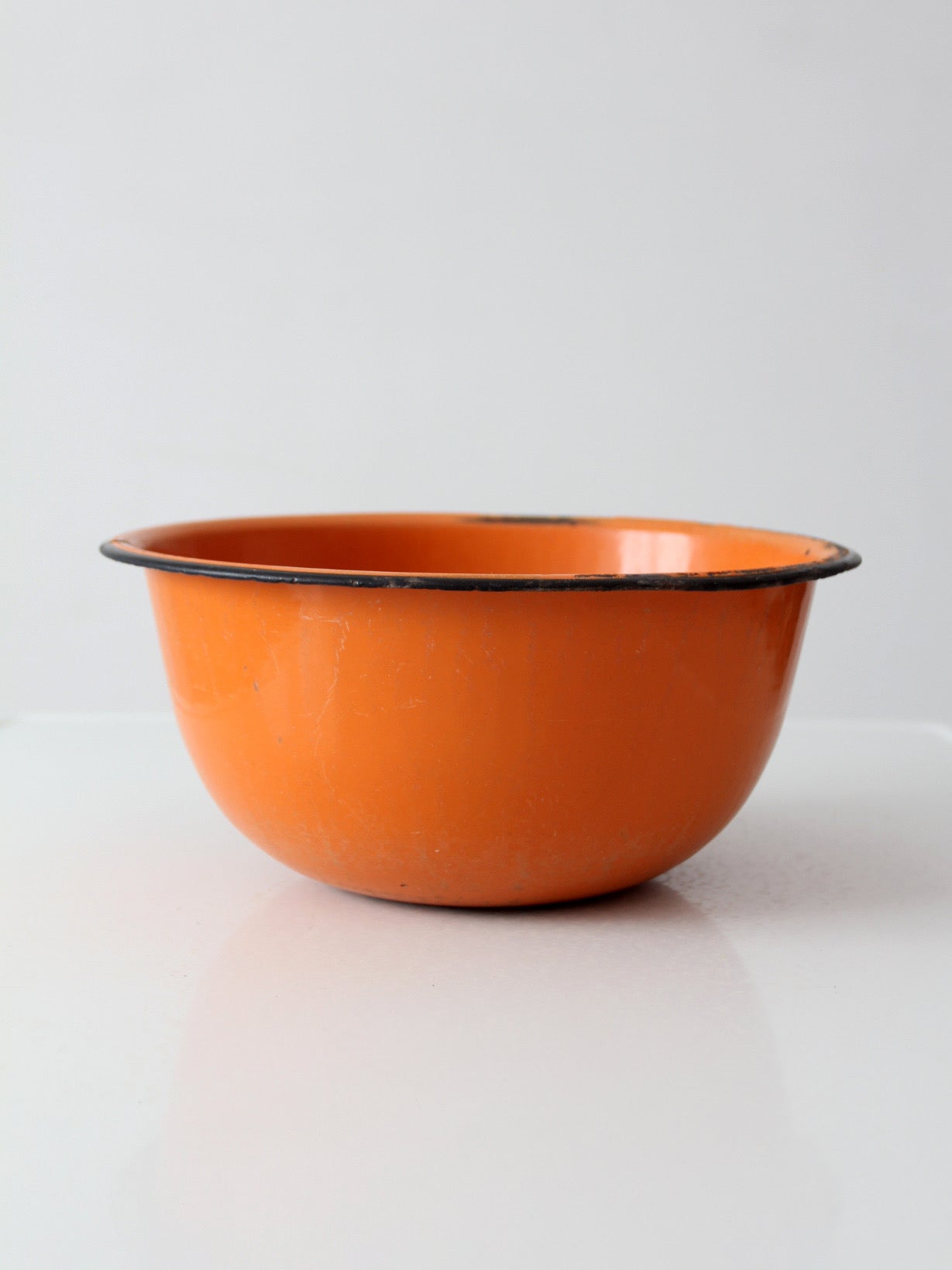 mid-century orange enamelware bowl