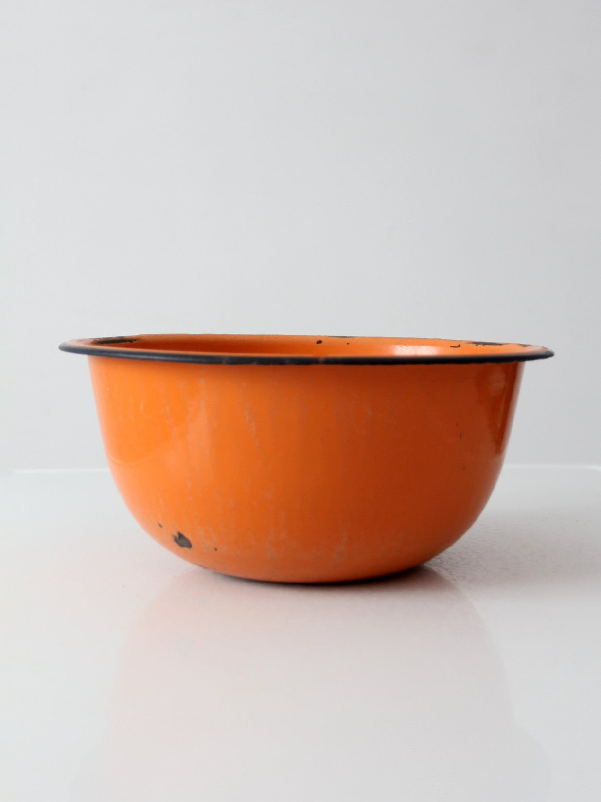 mid-century orange enamelware bowl