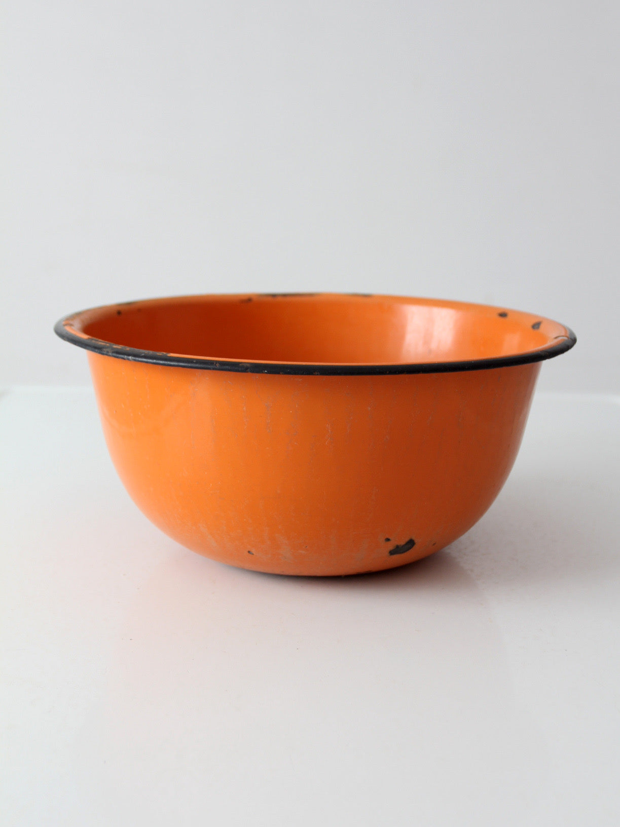 mid-century orange enamelware bowl