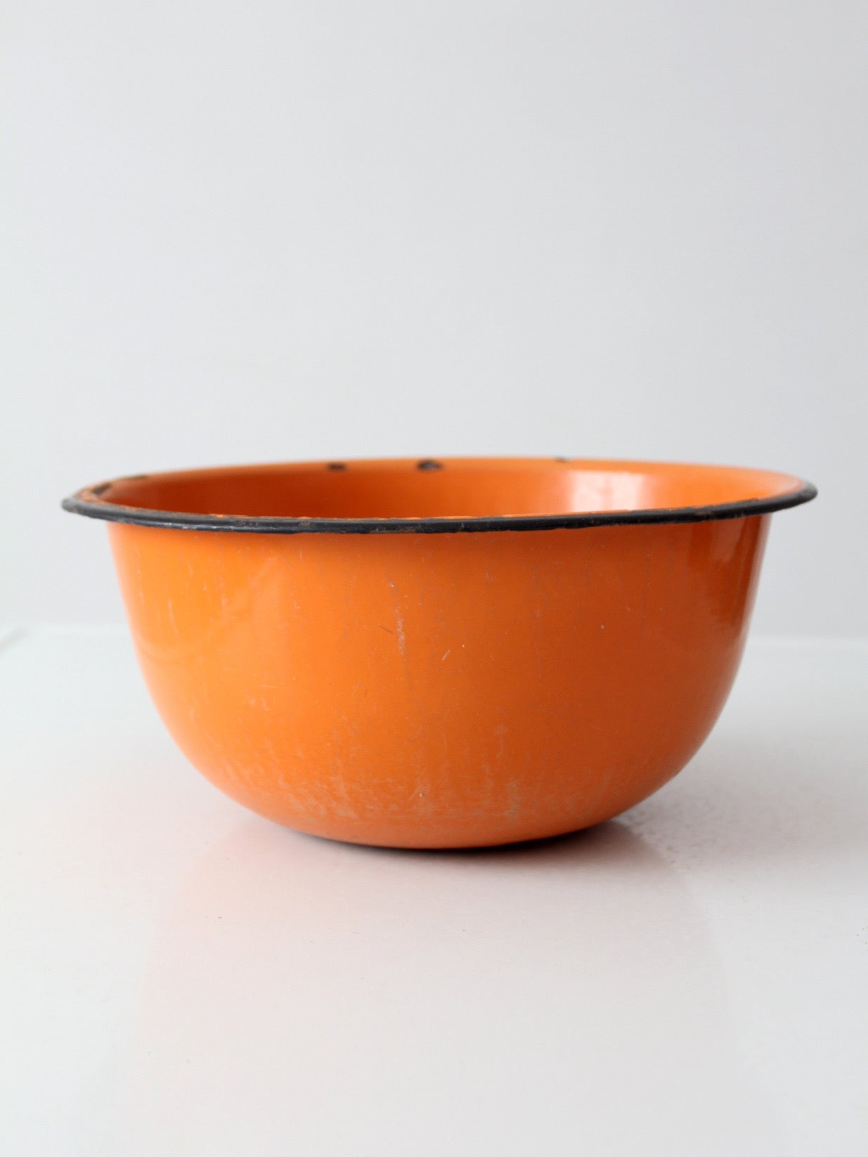 mid-century orange enamelware bowl