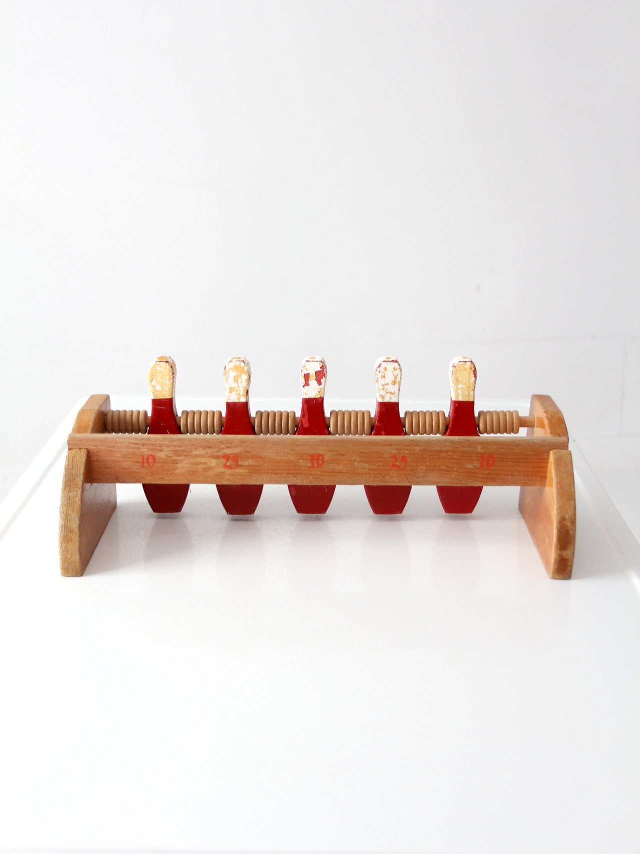 mid-century wooden tabletop bowling game