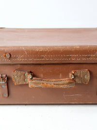 vintage brown leather suitcase