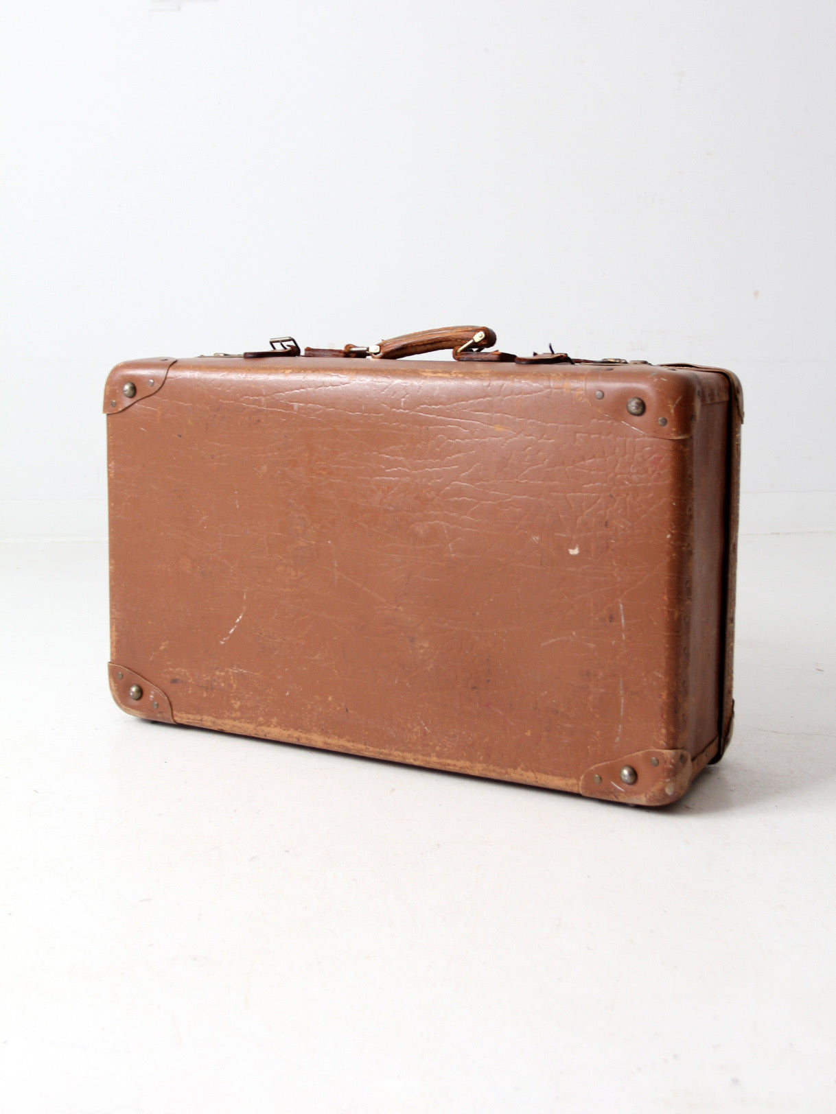 vintage brown leather suitcase