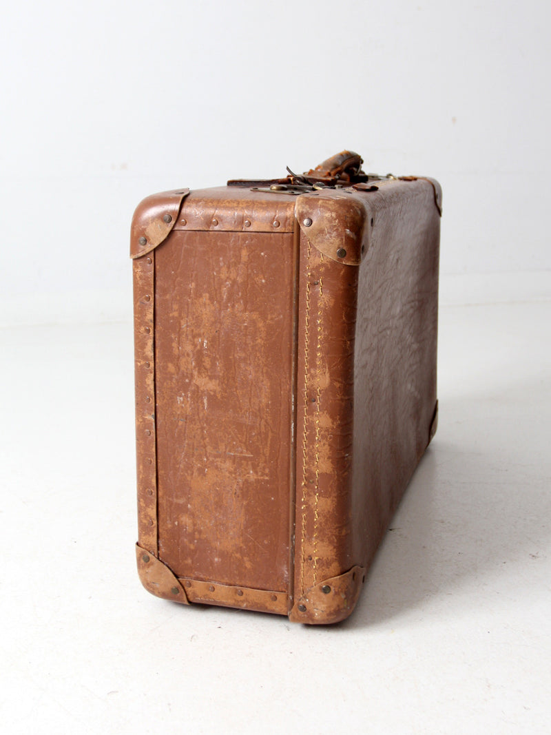 vintage brown leather suitcase