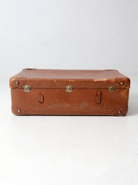vintage brown leather suitcase