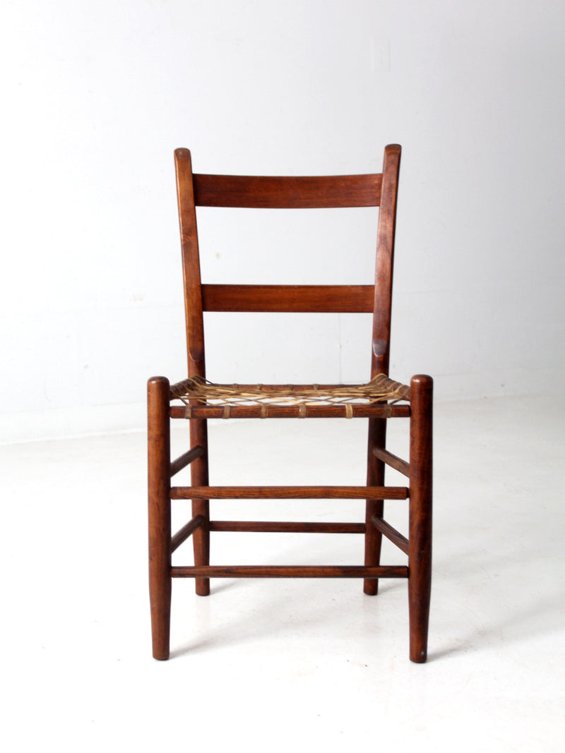 antique rawhide primitive chair