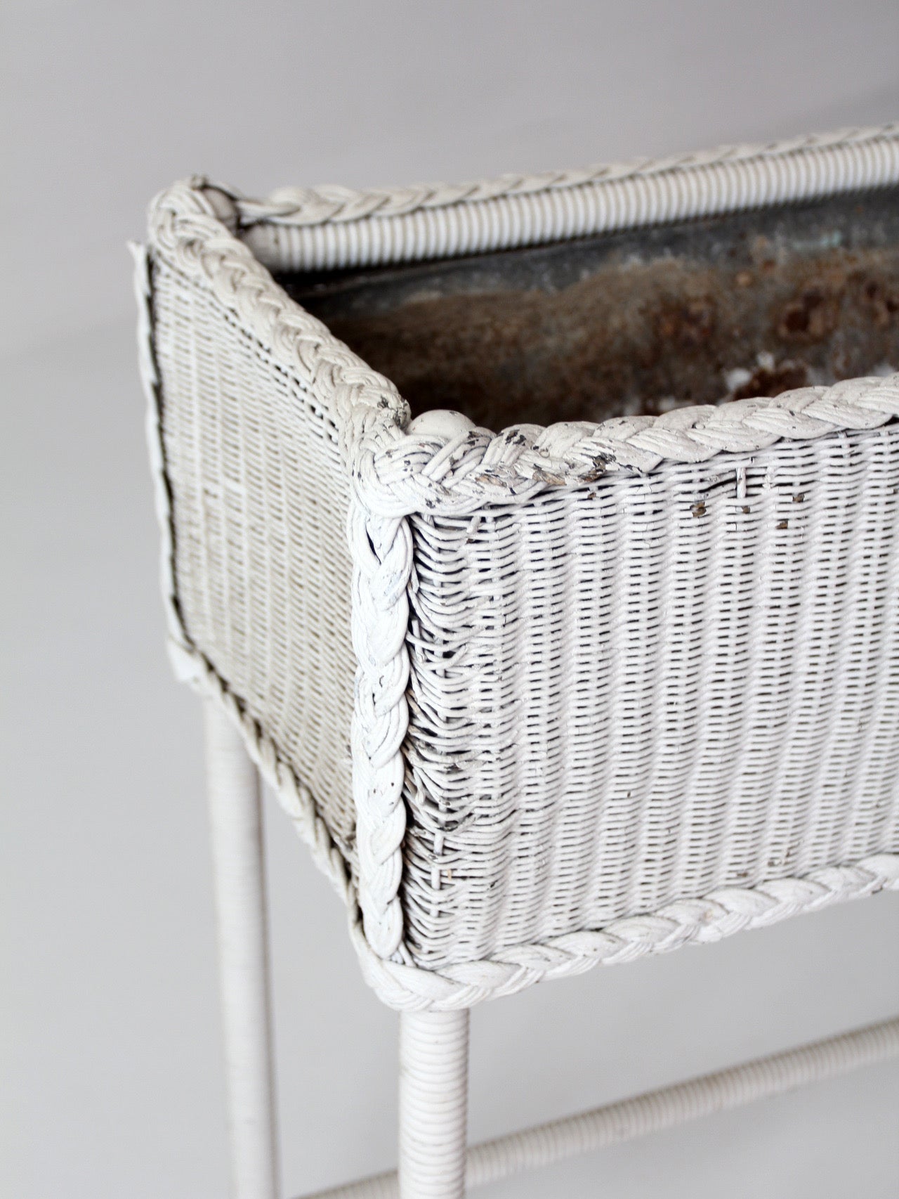 antique white wicker plant stand with removable metal liner