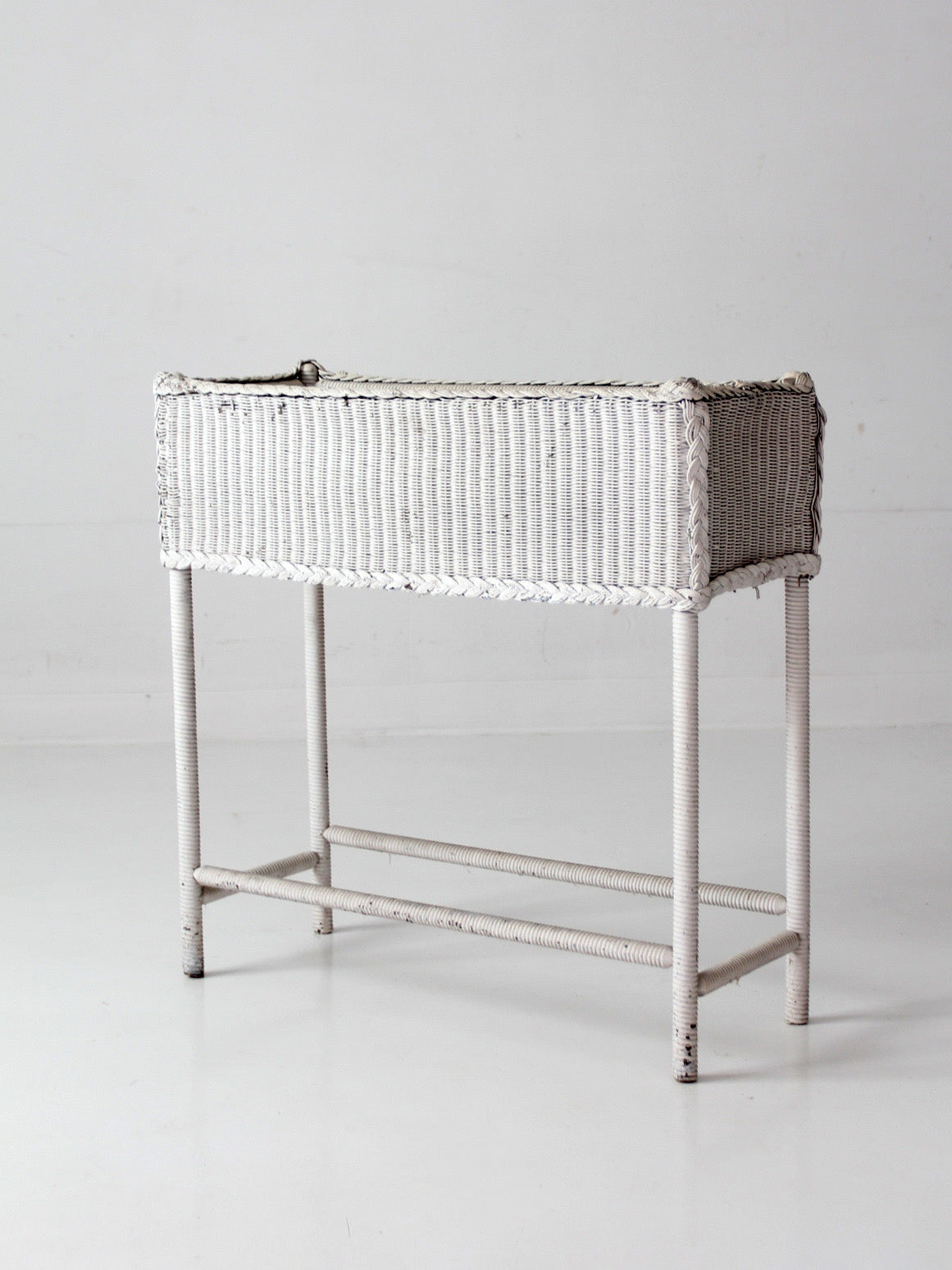 antique white wicker plant stand with removable metal liner