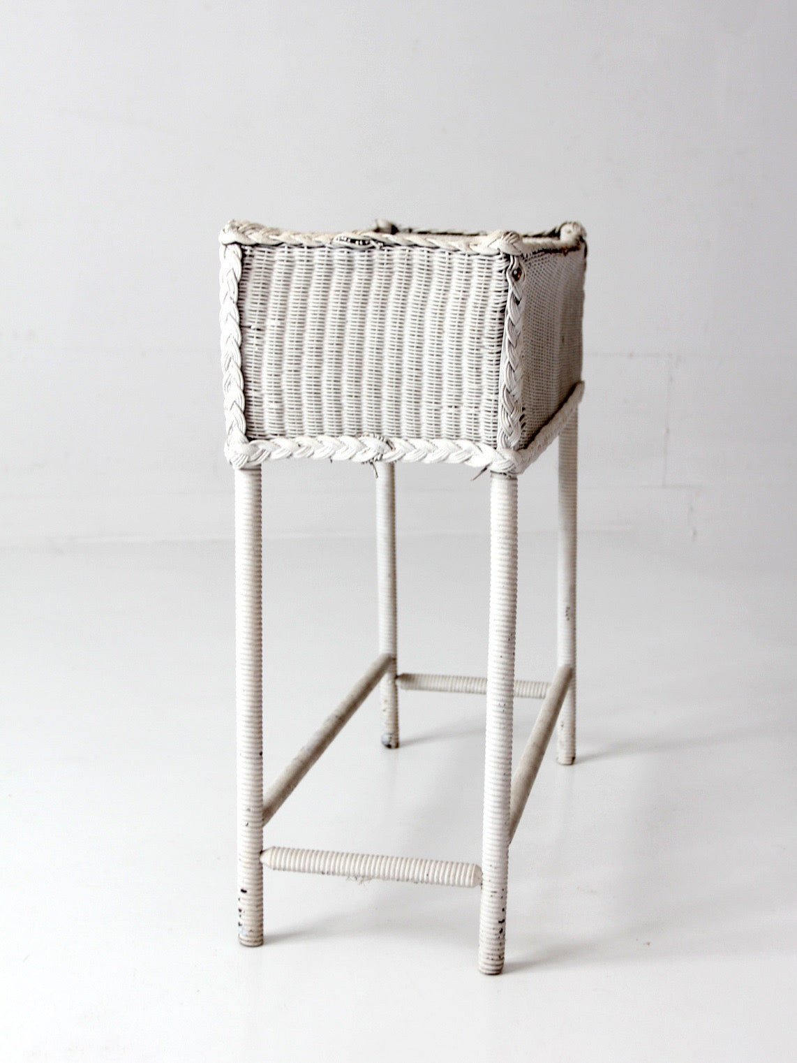 antique white wicker plant stand with removable metal liner