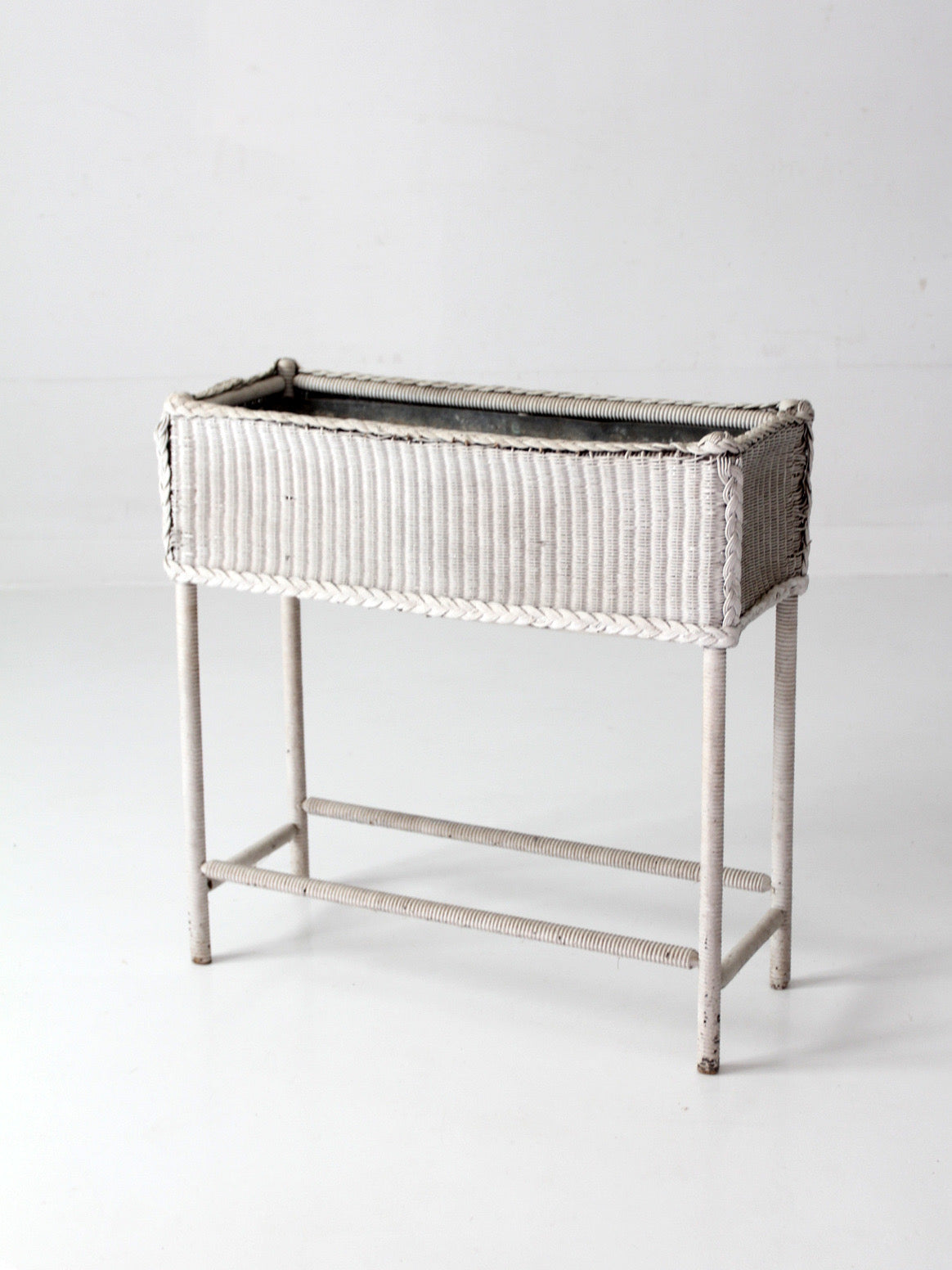 antique white wicker plant stand with removable metal liner