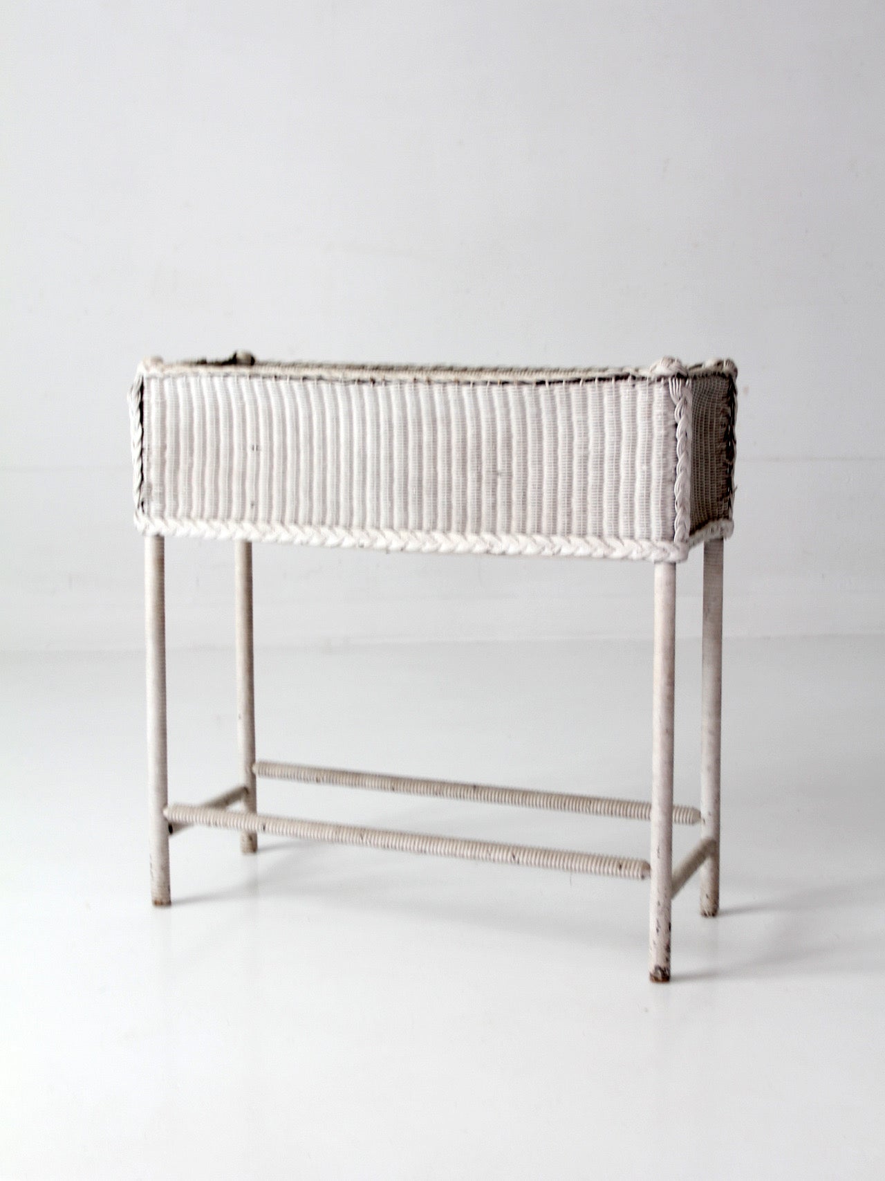 antique white wicker plant stand with removable metal liner
