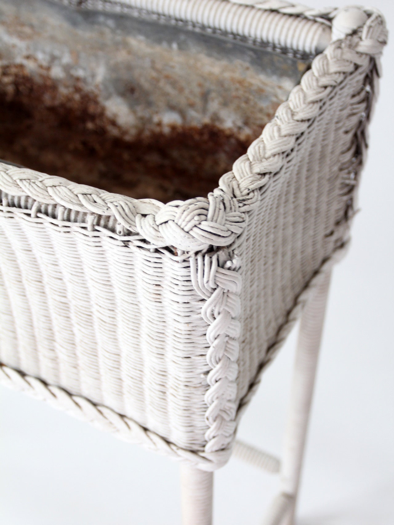 antique white wicker plant stand with removable metal liner