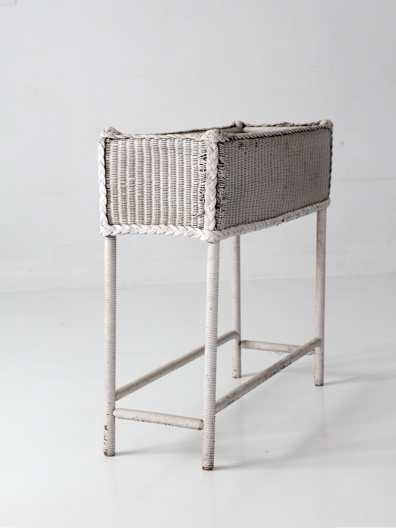 antique white wicker plant stand with removable metal liner