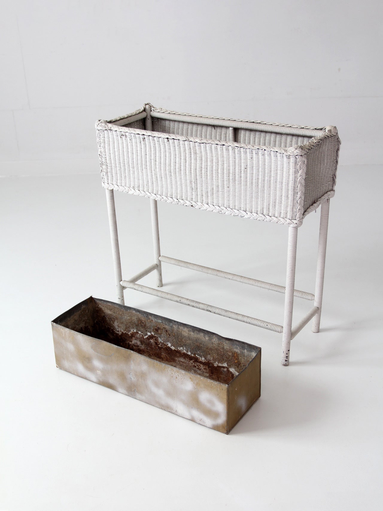 antique white wicker plant stand with removable metal liner
