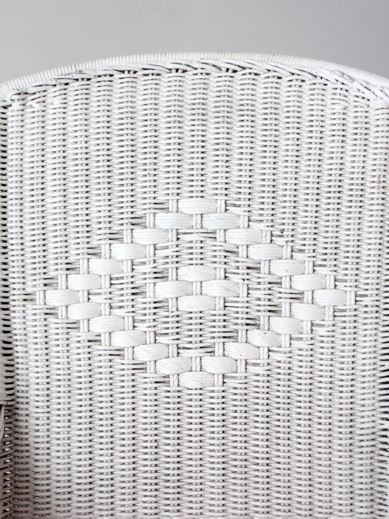 antique white wicker porch chair