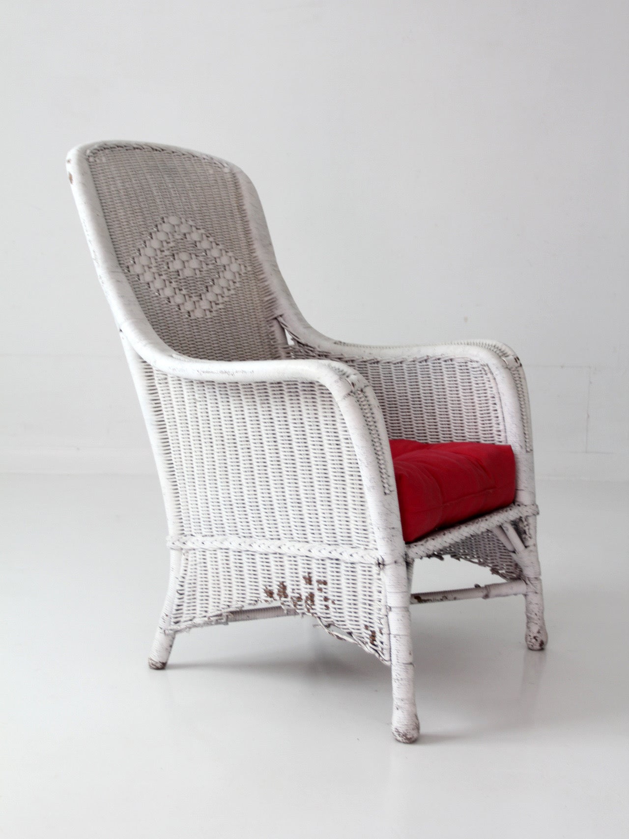 antique white wicker porch chair