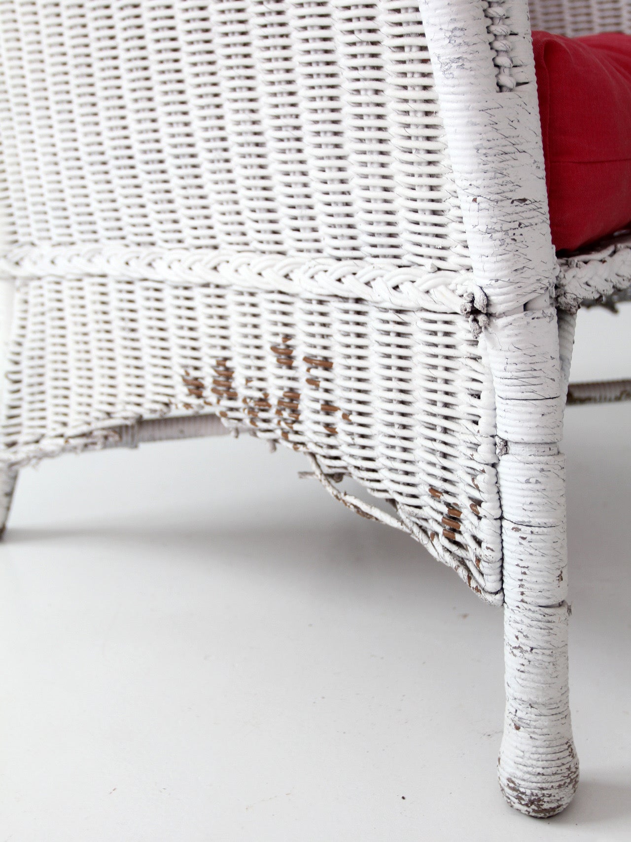 antique white wicker porch chair