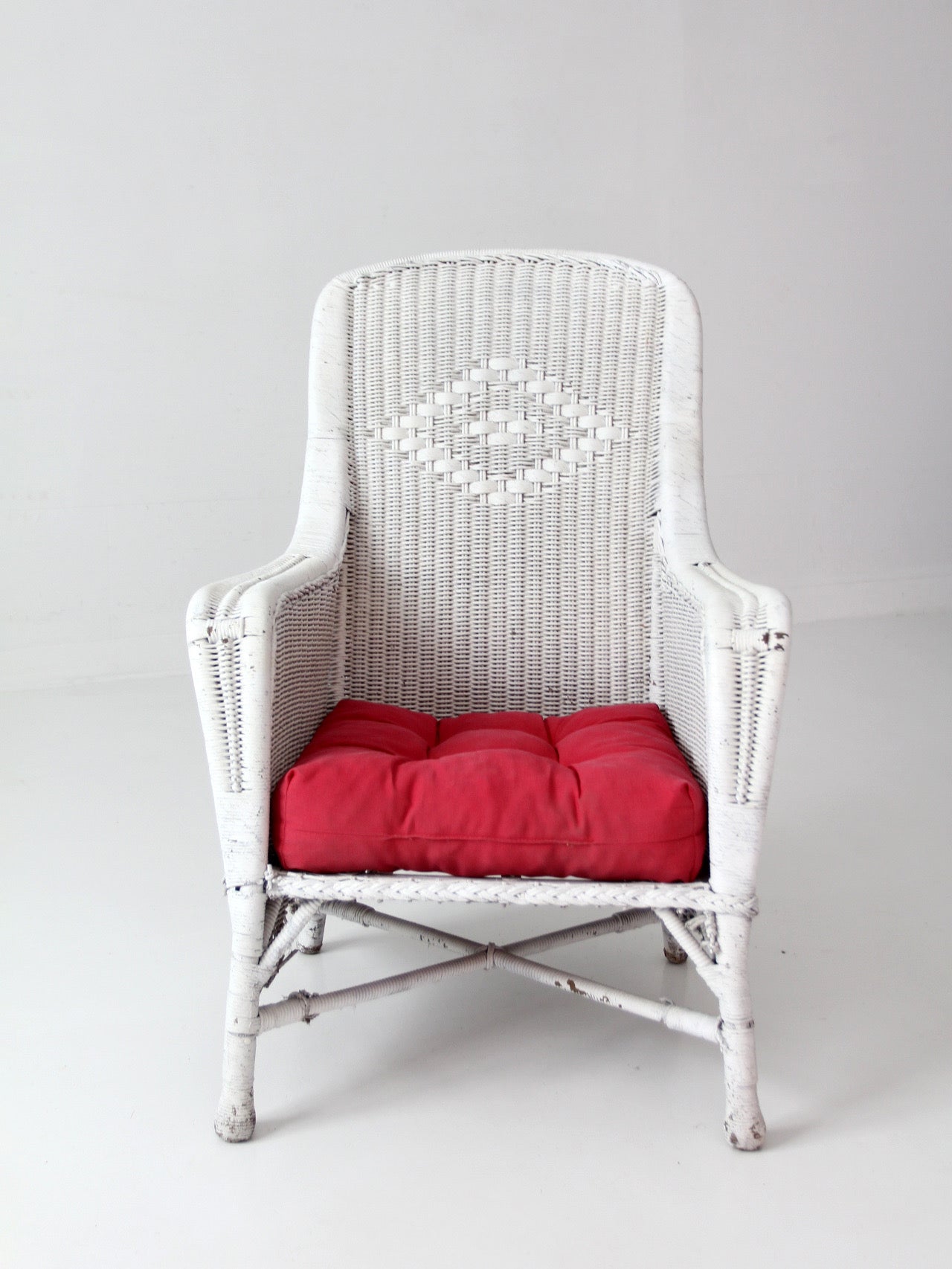 antique white wicker porch chair