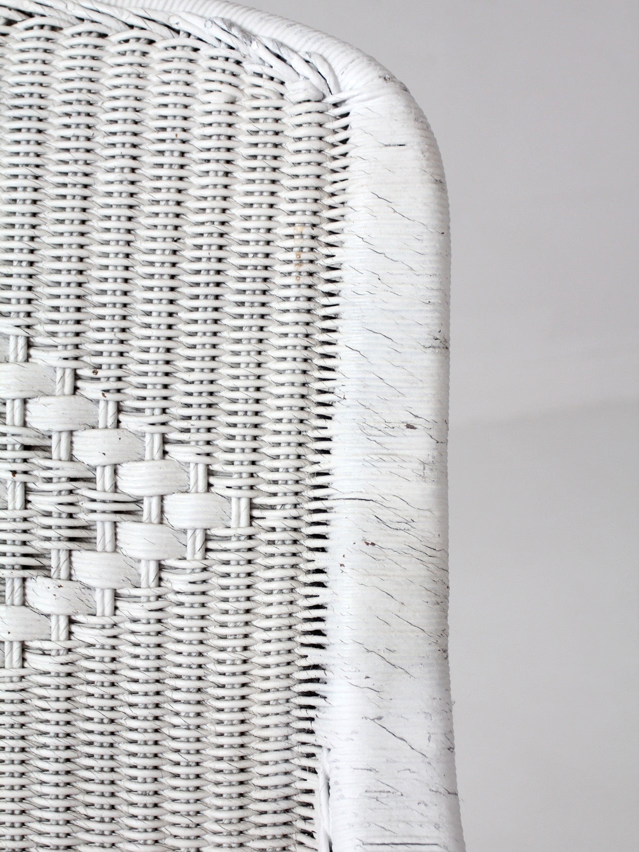 antique white wicker porch chair