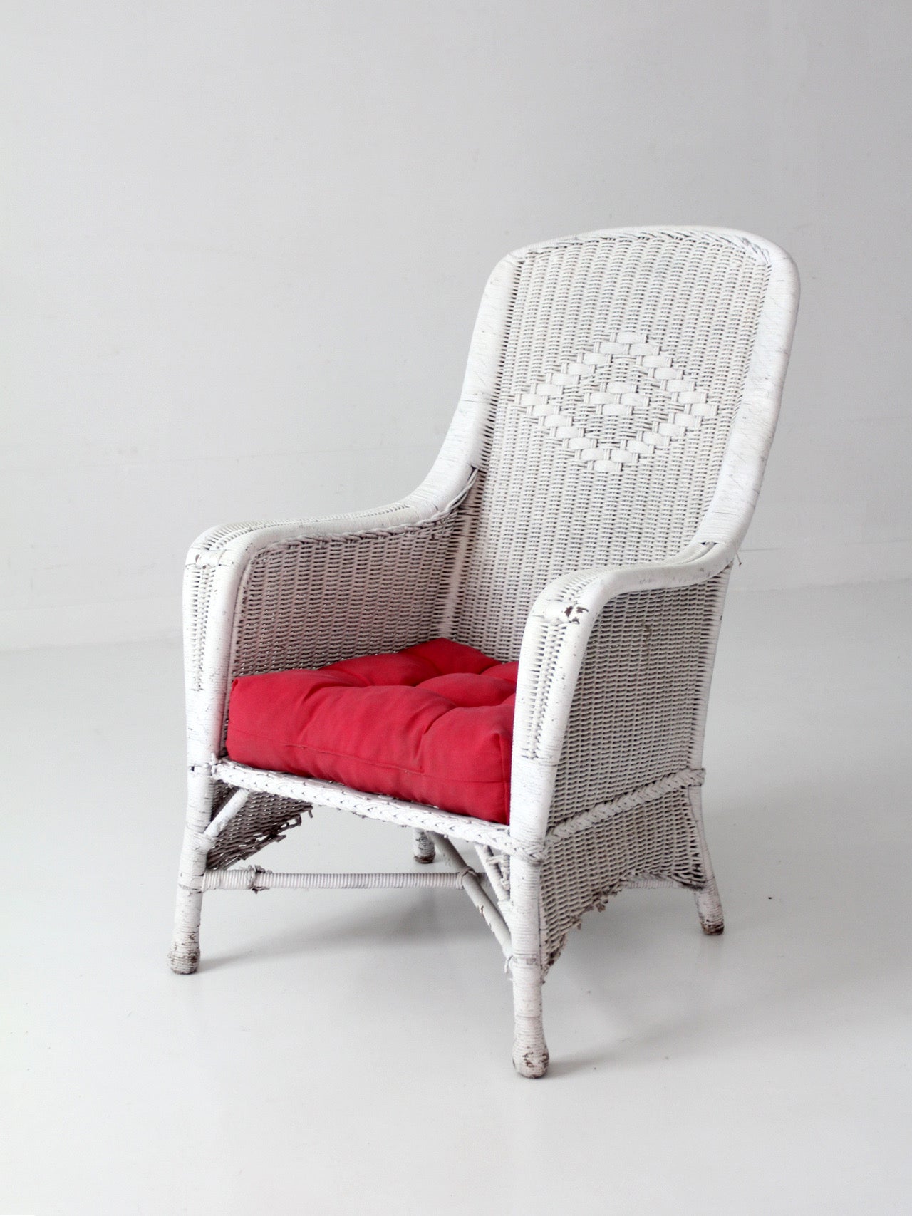 antique white wicker porch chair