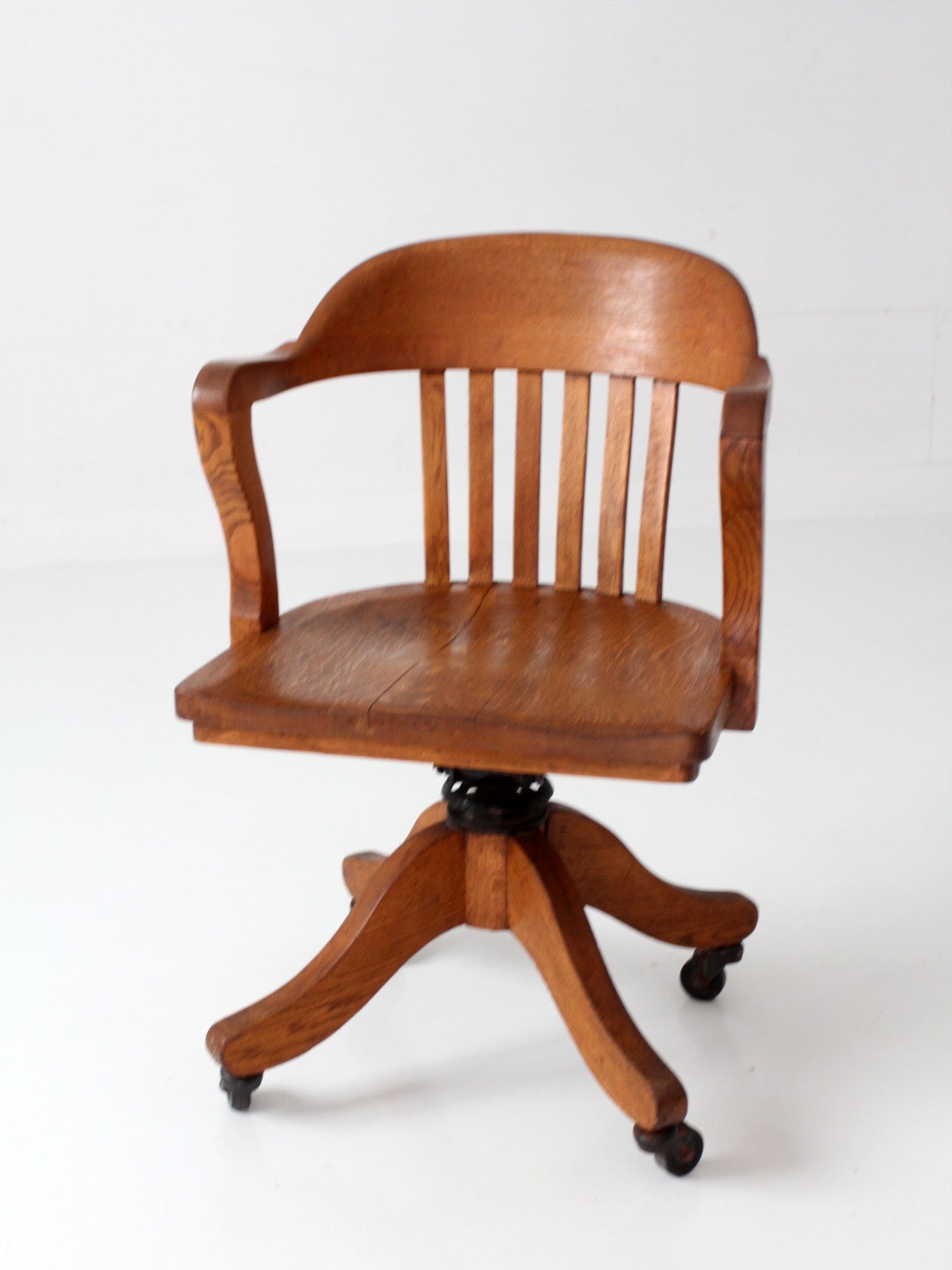 antique Gunlocke banker' swivel desk chair